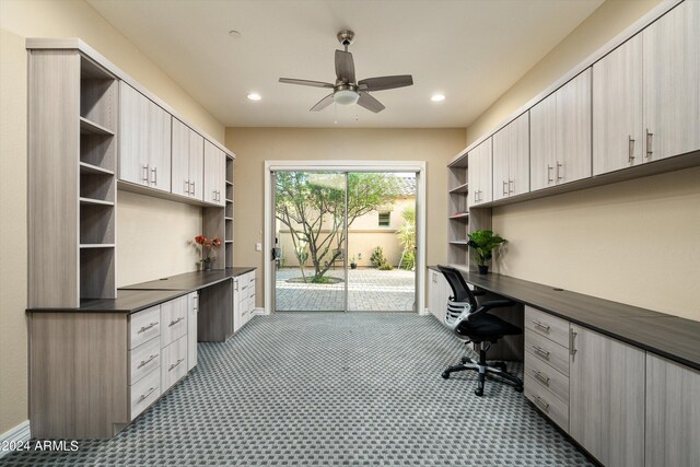 office featuring built in desk and ceiling fan