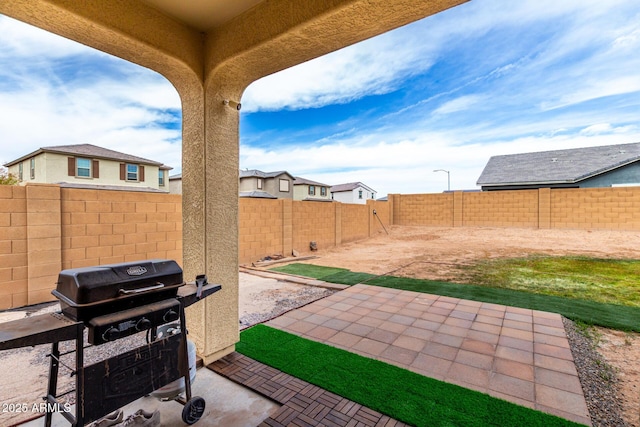 view of patio / terrace with a fenced backyard and grilling area