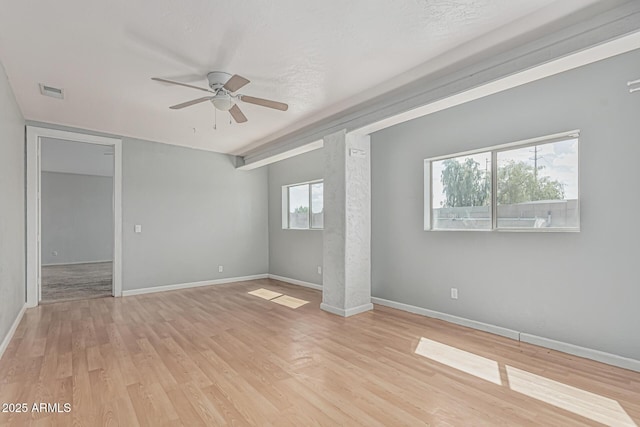 408 N Falcon Ct, Gilbert, AZ 85234 - unfurnished bedroom with visible vents, a ceiling fan, light wood-style flooring, and baseboards