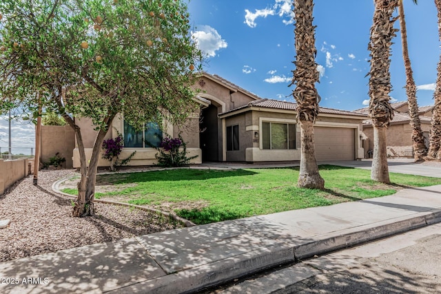 408 N Falcon Ct, Gilbert, AZ 85234 - mediterranean / spanish-style home with a tiled roof, a front yard, concrete driveway, an attached garage, and stucco siding