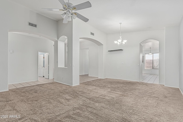 408 N Falcon Ct, Gilbert, AZ 85234 - tiled spare room with visible vents, arched walkways, carpet, and ceiling fan with notable chandelier