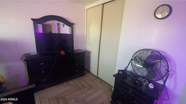 bedroom featuring parquet flooring