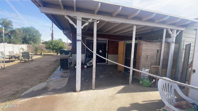 view of patio / terrace featuring an outdoor structure