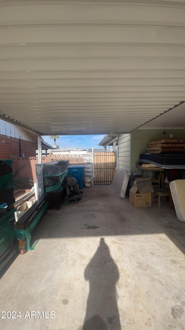 view of patio / terrace featuring a carport