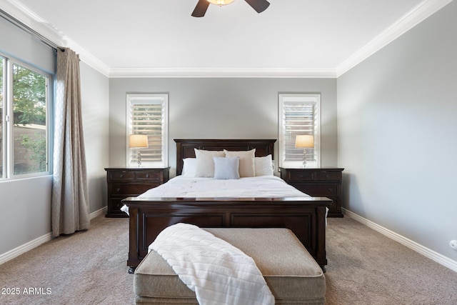 bedroom with baseboards, ornamental molding, a ceiling fan, and light colored carpet