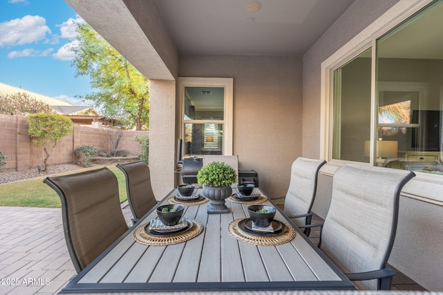 view of patio / terrace with fence