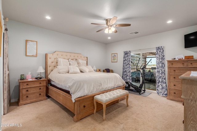 bedroom featuring ceiling fan, light colored carpet, and access to outside