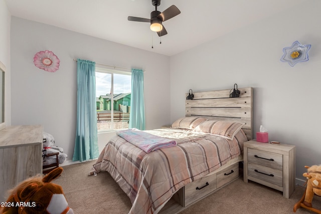 bedroom with light carpet and ceiling fan