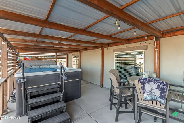 view of patio / terrace featuring a hot tub