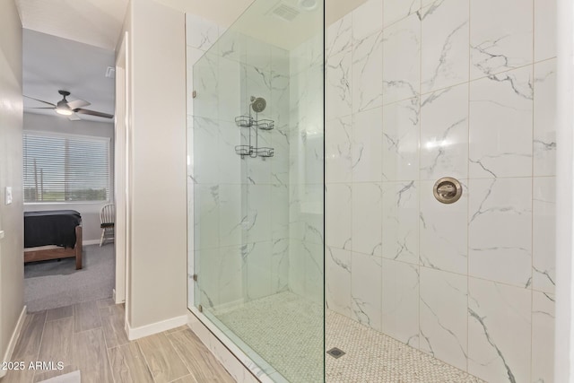 8026 S 6th Dr, Phoenix, AZ 85041 - bathroom with ensuite bathroom, visible vents, baseboards, ceiling fan, and a marble finish shower