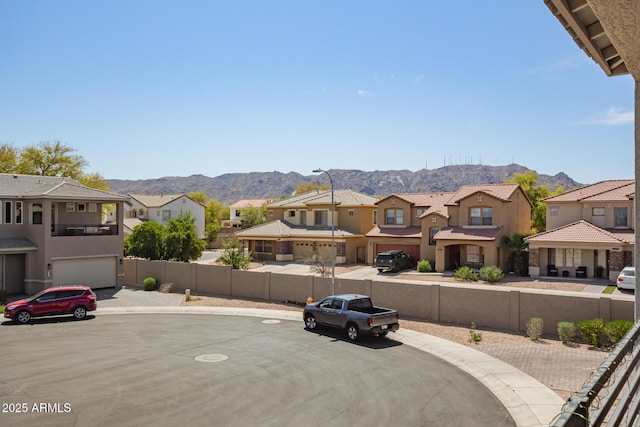 8026 S 6th Dr, Phoenix, AZ 85041 - view of street featuring street lights, a mountain view, curbs, and a residential view