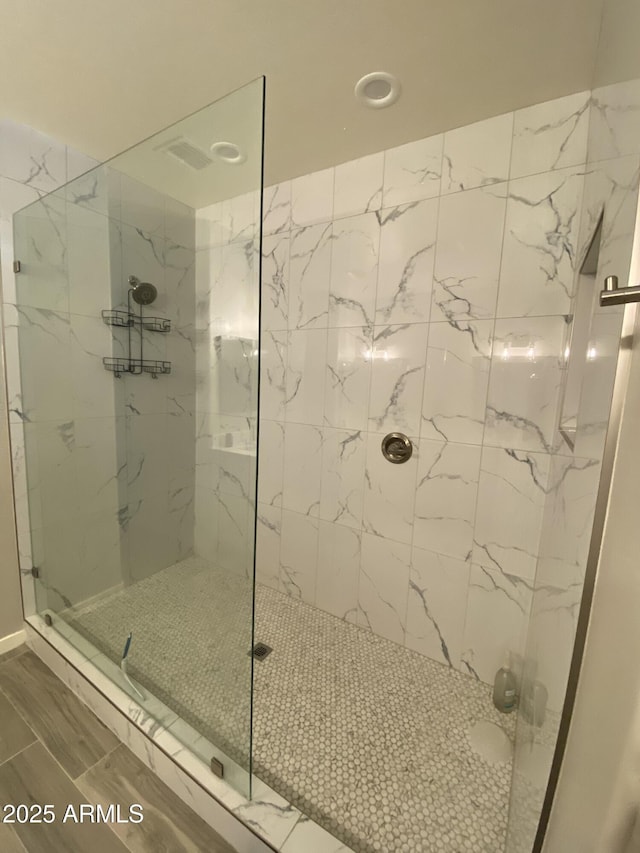 8026 S 6th Dr, Phoenix, AZ 85041 - bathroom featuring a marble finish shower