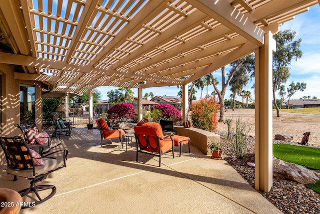 view of patio / terrace featuring outdoor dining space, fence, and a pergola