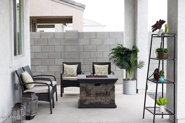 2324 E Marguerite Ave, Phoenix, AZ 85040 - view of patio / terrace with an outdoor fire pit
