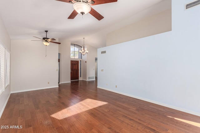 unfurnished living room with dark wood-type flooring, high vaulted ceiling, and ceiling fan with notable chandelier