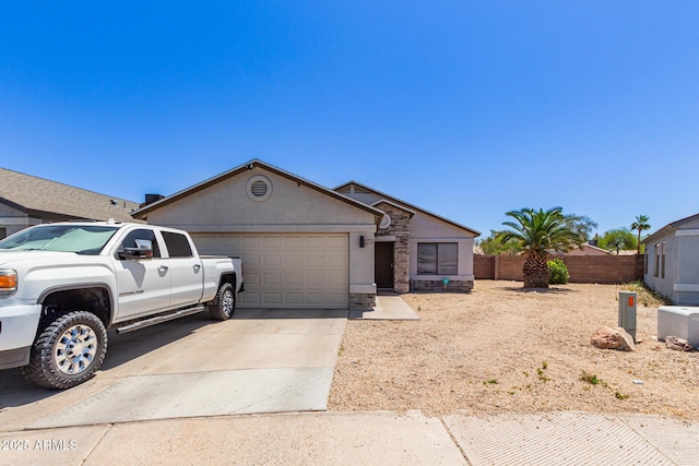 4741 N 85th Ave, Phoenix, AZ 85037 - ranch-style house with a garage, driveway, and stucco siding