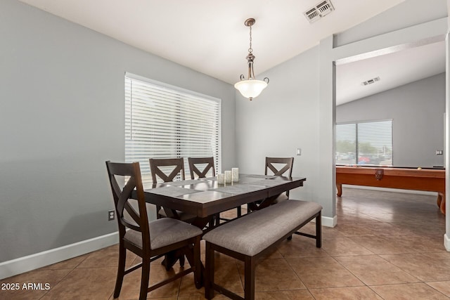 4741 N 85th Ave, Phoenix, AZ 85037 - dining area featuring light tile patterned flooring, lofted ceiling, and baseboards