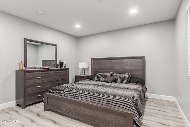 4741 N 85th Ave, Phoenix, AZ 85037 - bedroom with light wood finished floors, baseboards, and recessed lighting