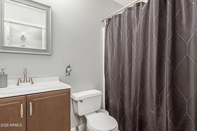4741 N 85th Ave, Phoenix, AZ 85037 - bathroom with toilet, vanity, a textured wall, and a shower with curtain