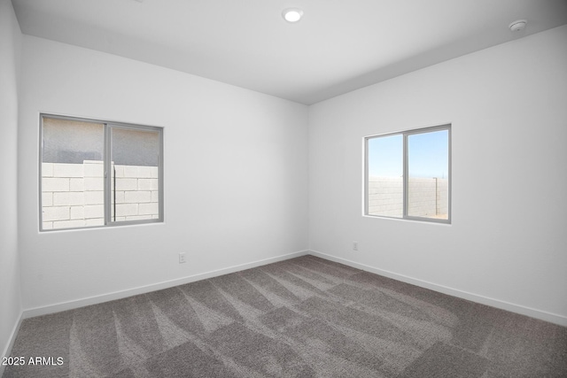 24606 W St Catherine Ave, Buckeye, AZ 85326 - unfurnished room featuring carpet and baseboards
