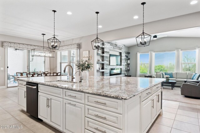 31320 N 54th Pl, Cave Creek, AZ 85331 - kitchen with open floor plan, a sink, light tile patterned floors, vaulted ceiling, and dishwasher