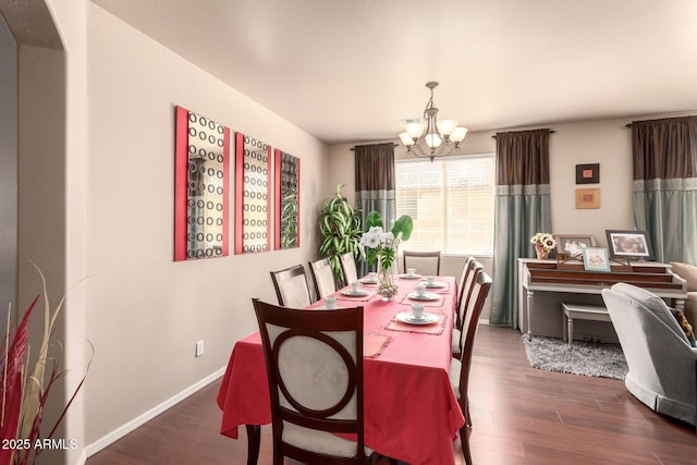 17153 W Gambit Trl, Surprise, AZ 85387 - dining area featuring a chandelier and dark wood finished floors