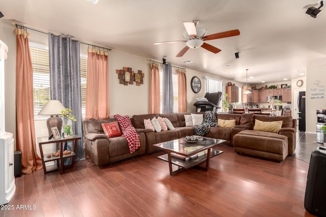 17153 W Gambit Trl, Surprise, AZ 85387 - living area featuring ceiling fan, healthy amount of natural light, wood finished floors, and recessed lighting