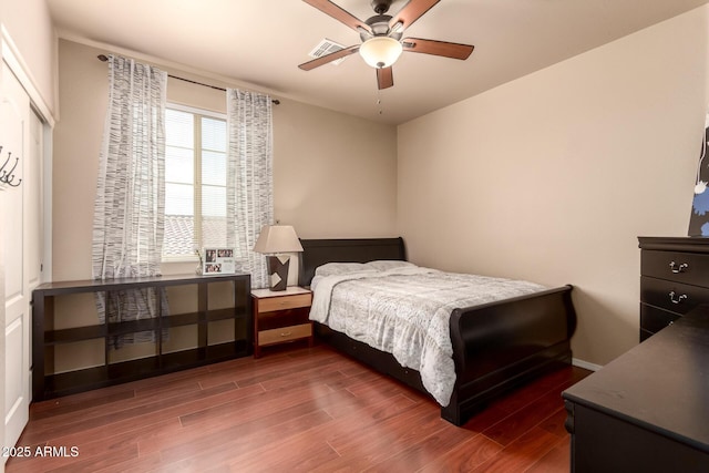 17153 W Gambit Trl, Surprise, AZ 85387 - bedroom featuring dark wood finished floors and ceiling fan
