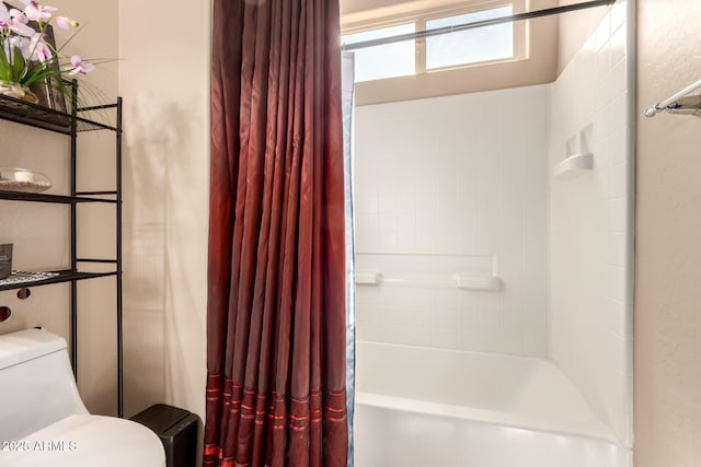 17153 W Gambit Trl, Surprise, AZ 85387 - bathroom featuring shower / bath combo and toilet