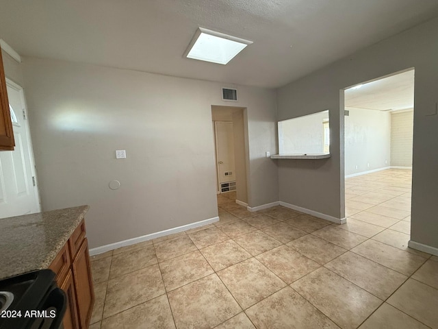 interior space featuring light tile patterned flooring