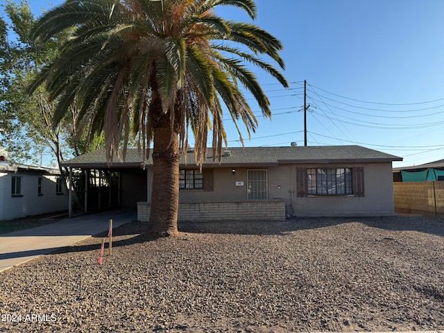 view of front facade featuring a carport