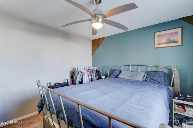 bedroom featuring baseboards, carpet, and ceiling fan