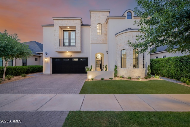 24905 S 206th Pl, Queen Creek, AZ 85142 - view of front facade featuring stone siding, driveway, a garage, and a lawn