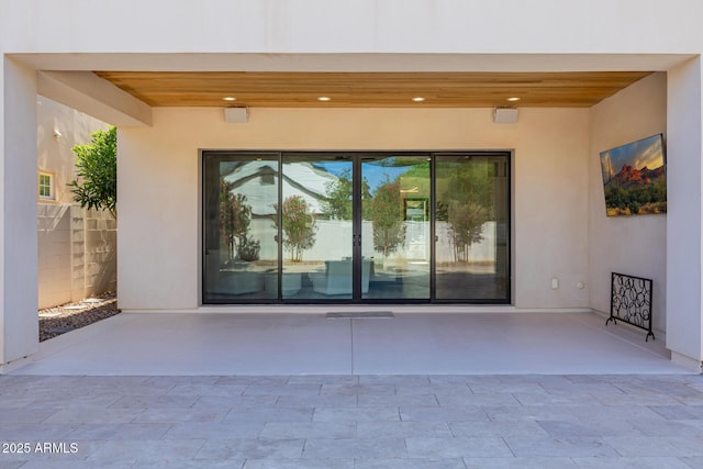 24905 S 206th Pl, Queen Creek, AZ 85142 - view of exterior entry with stucco siding and a patio