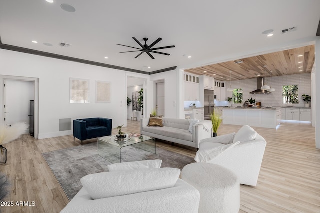 24905 S 206th Pl, Queen Creek, AZ 85142 - living room featuring light wood finished floors, a ceiling fan, recessed lighting, and baseboards