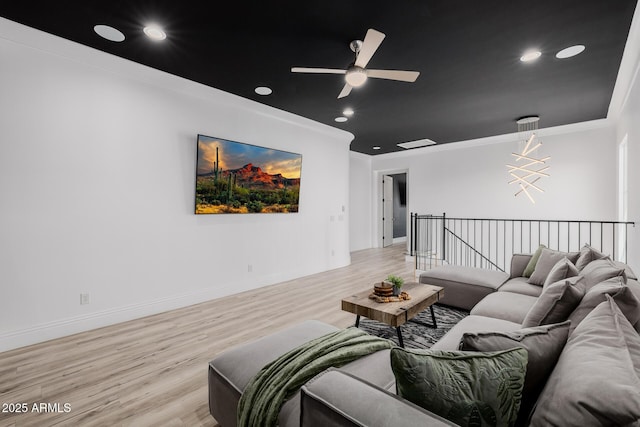 24905 S 206th Pl, Queen Creek, AZ 85142 - living room featuring light wood finished floors, ornamental molding, ceiling fan, recessed lighting, and baseboards