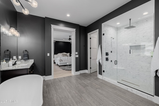 24905 S 206th Pl, Queen Creek, AZ 85142 - ensuite bathroom featuring a soaking tub, a stall shower, vanity, recessed lighting, and baseboards