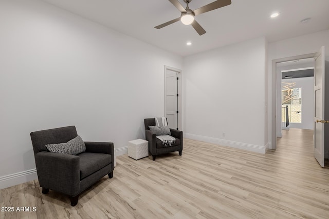 24905 S 206th Pl, Queen Creek, AZ 85142 - living area with baseboards, light wood finished floors, a ceiling fan, and recessed lighting
