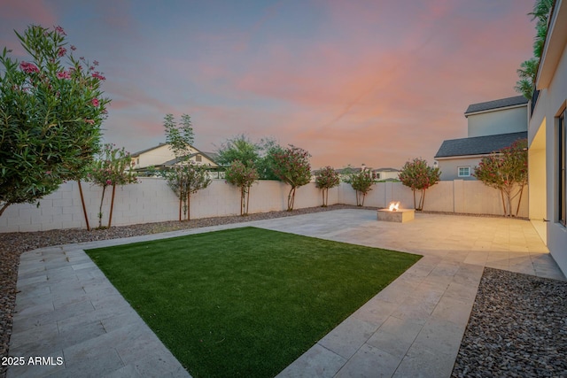 24905 S 206th Pl, Queen Creek, AZ 85142 - yard at dusk featuring a patio and a fire pit