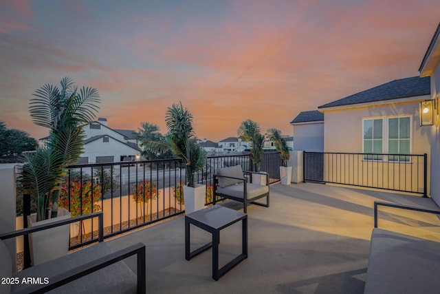 24905 S 206th Pl, Queen Creek, AZ 85142 - patio terrace at dusk with a balcony and a residential view
