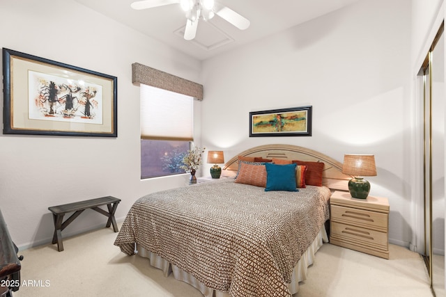 carpeted bedroom with ceiling fan