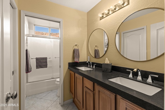 full bathroom featuring tile patterned floors, vanity, toilet, and combined bath / shower with glass door