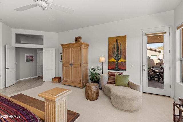 living room featuring ceiling fan