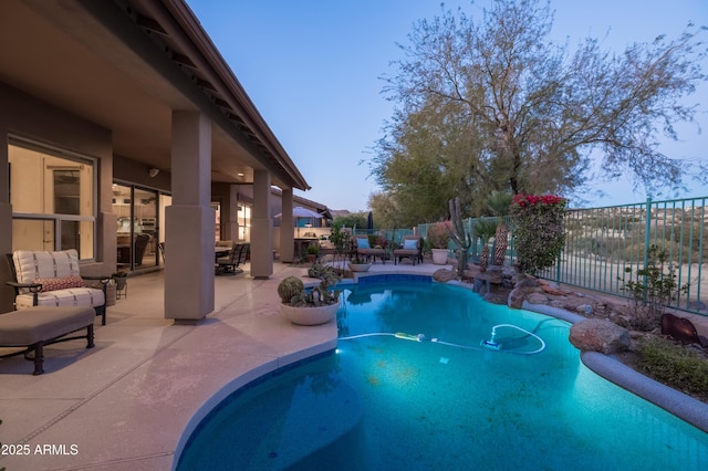 view of pool featuring a patio