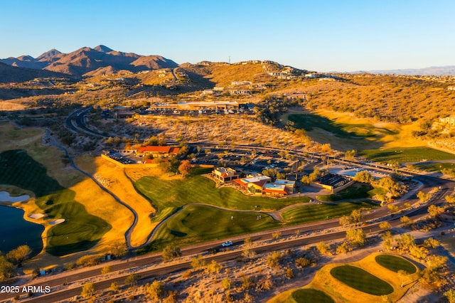 birds eye view of property featuring a mountain view