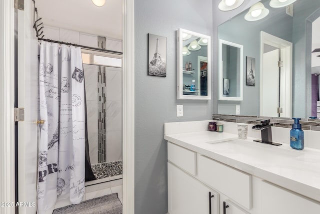 bathroom with vanity and a shower with curtain