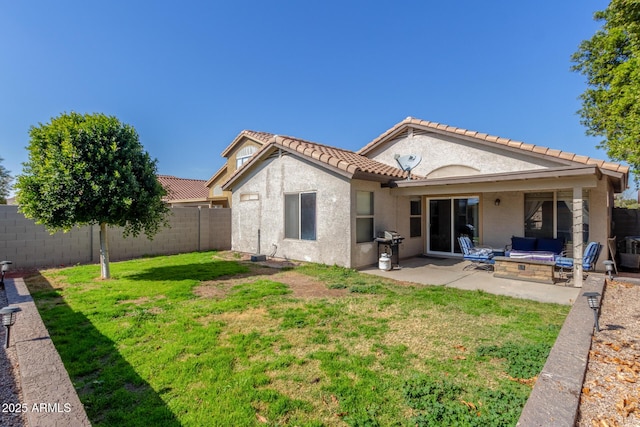 rear view of property with a patio, an outdoor hangout area, and a lawn