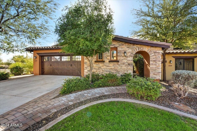 view of front of home featuring a garage