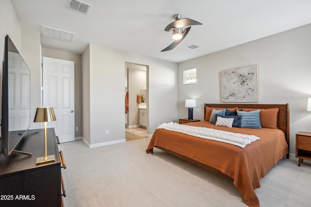 carpeted bedroom featuring connected bathroom and ceiling fan