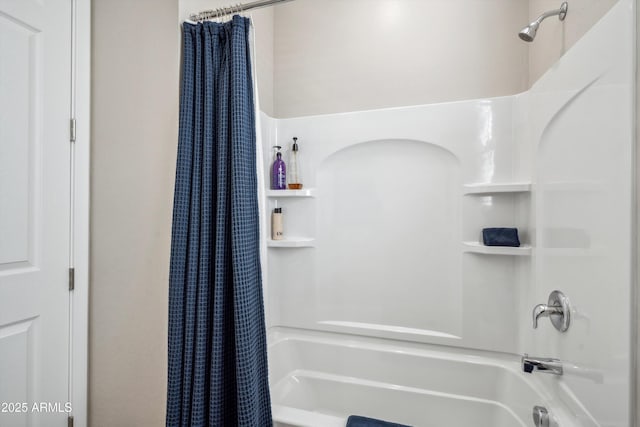 bathroom with shower / tub combo